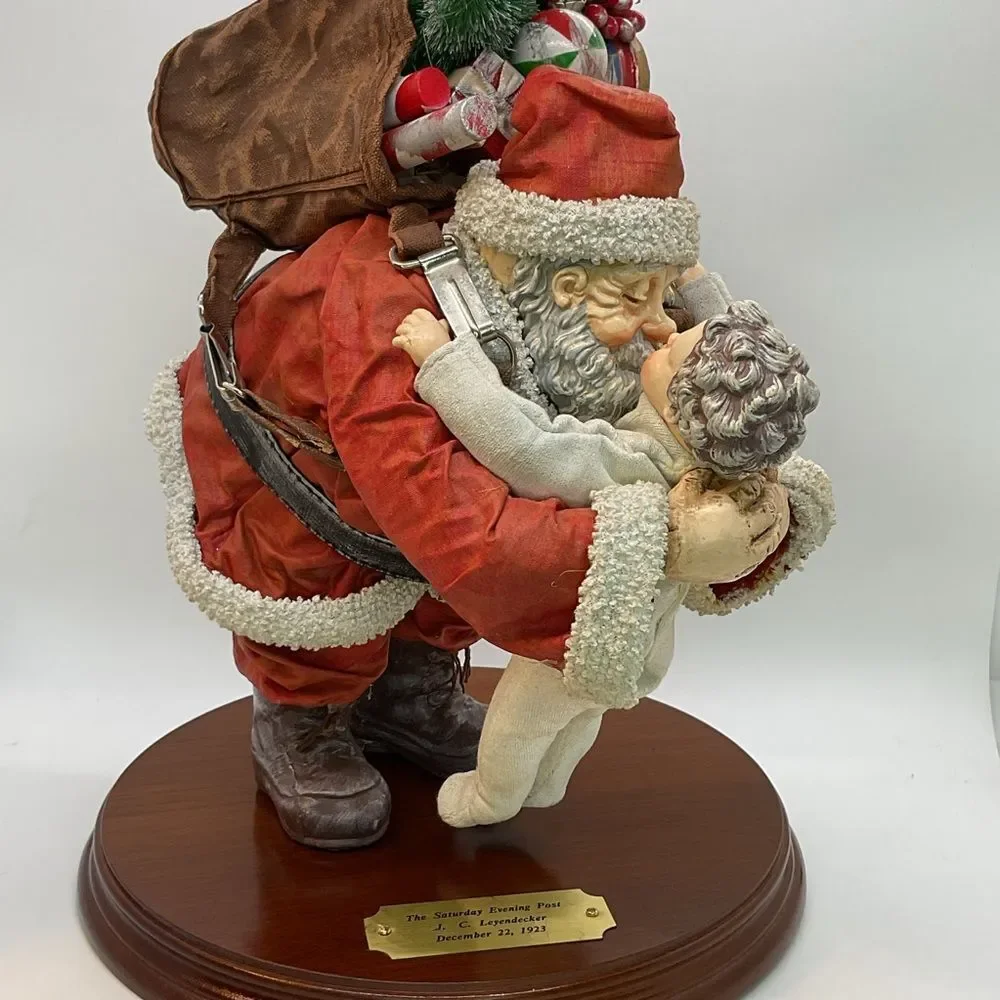Clothtique Santa and Child Sculpture - Saturday Evening Post